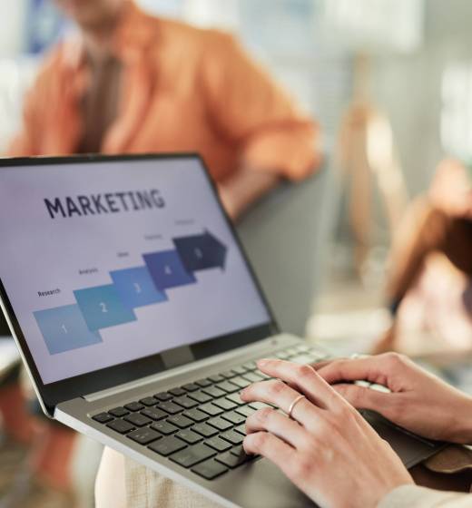 Marketing Data On Laptop Screen Close up background image of woman typing at laptop with marketing statistics on screen, copy space